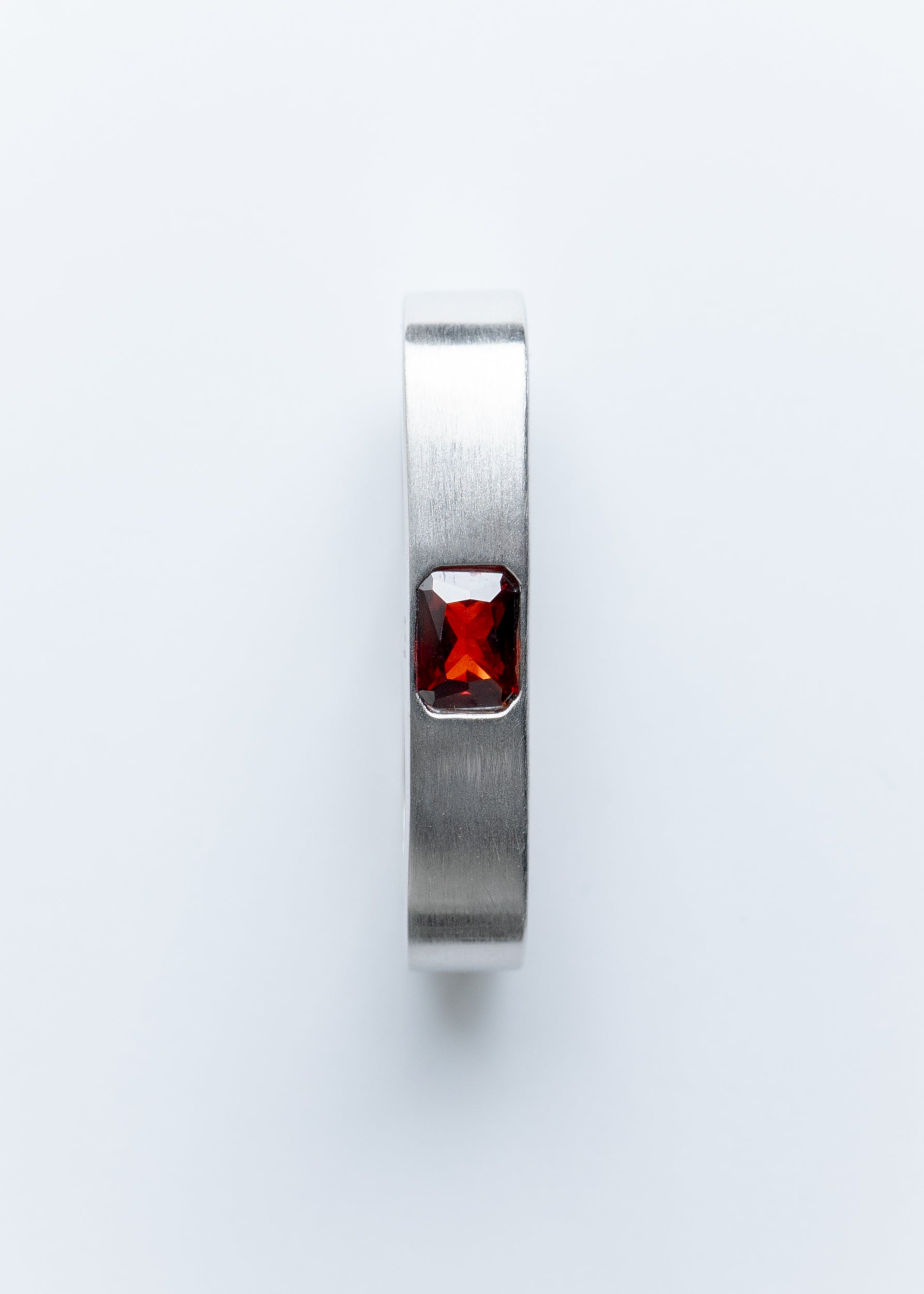 Maison Nwar silver ring with rectangular red gemstone, front view