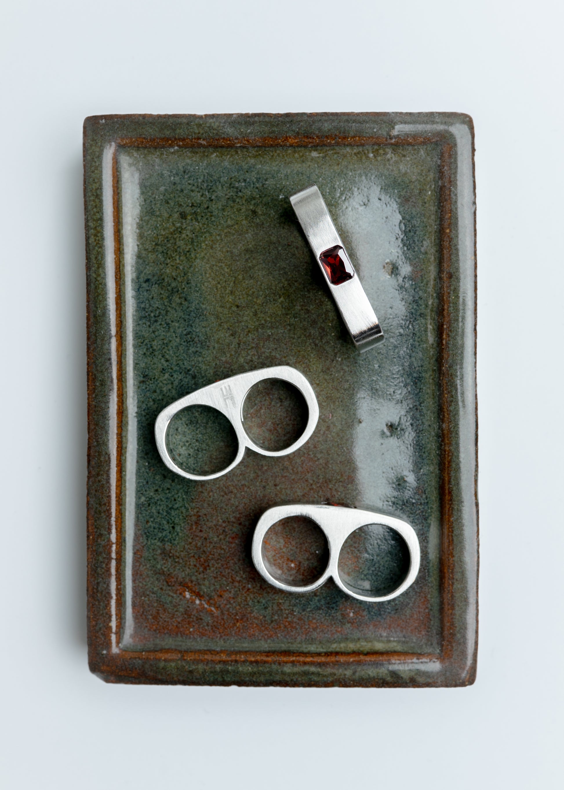 Maison Nwar rings displayed in branded jewelry box flat lay