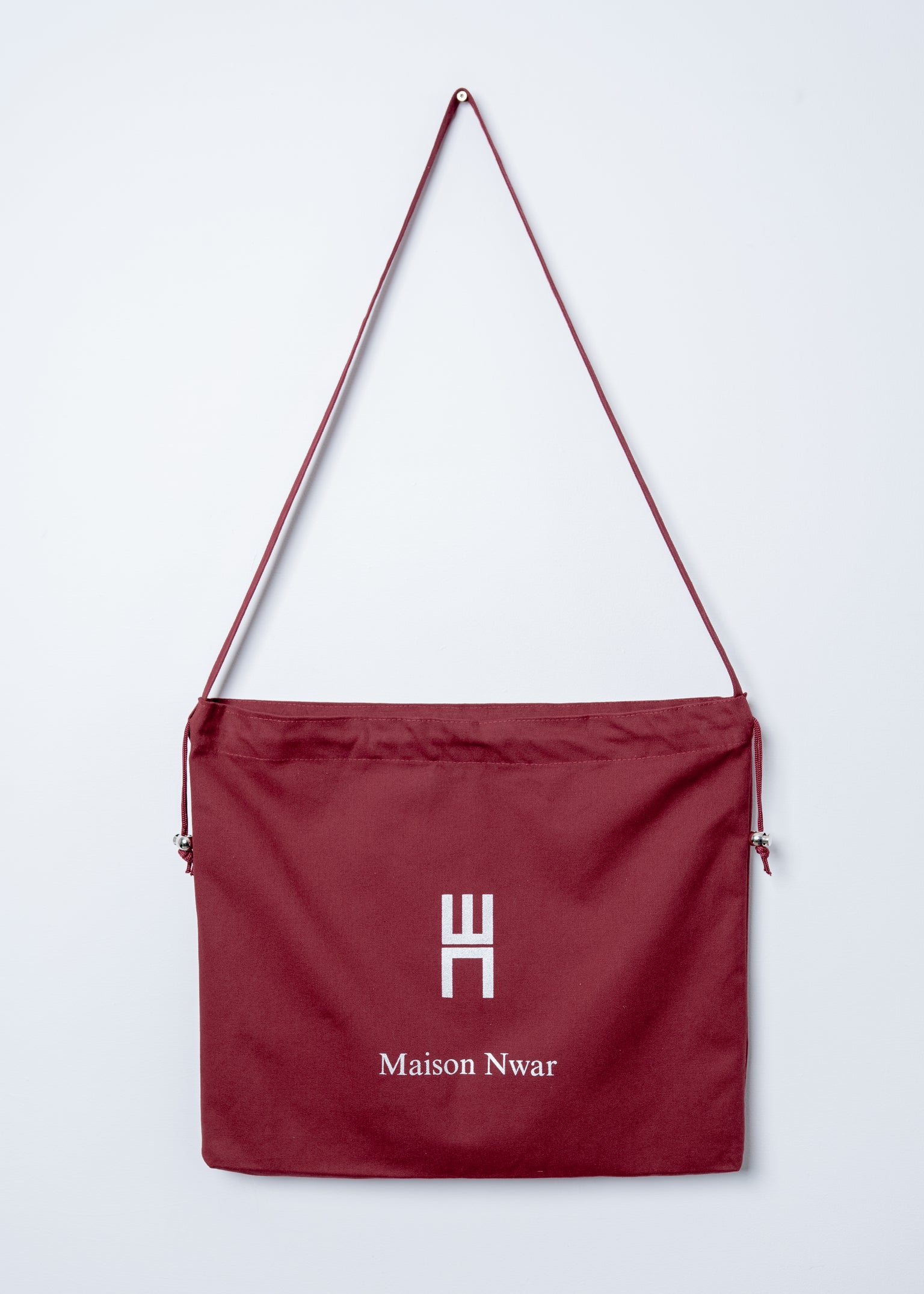 Maison Nwar Tote Bag in burgundy canvas – front view